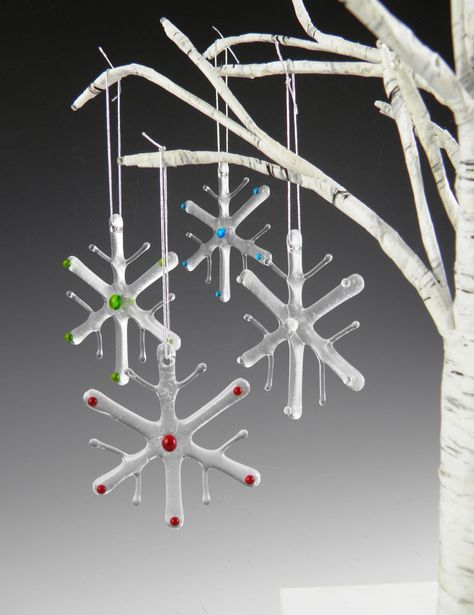 This delicate handmade fused glass snowflake ornament will make a festive addition to your Christmas tree and holiday decorations. It would also add a lovely touch as an embellishment on your beautifully wrapped present or make a special hostess gift.  The clear snowflake shimmers with a subtle silver iridescence when caught by light. Small glass gem accents in red, green, blue or clear adorn the center and tips of the snowflake's main branches. Smaller clear sidebranches also serve to enhance t Fused Glass Ornaments Christmas, Fused Glass Christmas Trees, Fused Glass Snowflakes, Fused Glass Christmas Ornaments, Fused Glass Christmas, Glass Fusion Ideas, Fused Glass Ornaments, Glass Fusing Projects, Glass Fusion