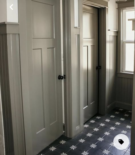 Conduit Gray Sherwin Williams, Contrast Trim And Doors, Earth Tone Mudroom, Painted Trim Living Room, Contrasting Trim Interior, Painted Trim And Doors, French Country Hallway, Painted Millwork, Easter House