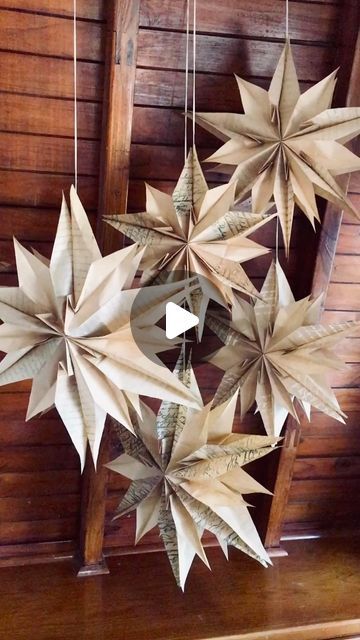 Redesign Petites on Instagram: "These paper bag stars are so easy and fun to create! We decided to put a redesign twist on this classic decor project just in time for the holidays. We applied our amazing Chalk Paste®️to our Decor Stamps®️using a foam roller. Stamp both sides of the bags. The paste dries quickly and goes onto the bag surface like a dream! The bags themselves look amazing and could be used for gift giving too! 

We used 6 bags for each star. Apply the double sided tape to the side that has the bottom folded. Apply in a “T” shape and be sure not to add tape all the way to the top so your star can fan out nicely. We cut ours all at once but you can do a couple at a time if your scissors aren’t as sharp. 
Add string with a glue gun between the tips for hanging. 

This would be Paper Bags Stars, Big Paper Star, Paperbag Stars, Paper Bag Ornaments, Paper Bag Stars Diy, Hanging Paper Stars, Paper Bag Stars, Folded Paper Stars, Homemade Lamps