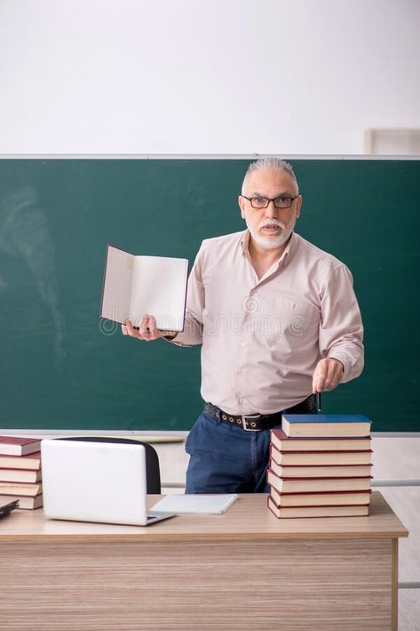 Old male teacher sitting in the classroom royalty free stock photo Jon Core, Old Man Clothes, Teacher Man, Male Teachers, Teacher Picture, Teacher Gif, Bad Teacher, Teacher Photo, Male Teacher