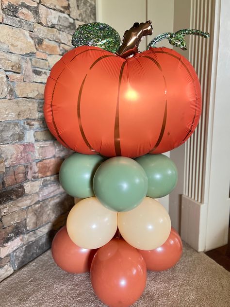 "Green and orange pumpkin balloon tower diy kit! These stunning, one-of-kind balloons are the perfect way to make a pop at your next event! No need for helium, save money by inflating with air! Make beautiful centerpieces for parties or also a wonderful way to celebrate a coworker, teacher, loved one...the possibilities are endless! This Balloon Tower DIY Kit includes: -A set of 12 standard 11\" Latex Balloons in colors shown -One 25\" Pumpkin Mylar Balloon  -1 Twister balloon -Instructions *OPT Balloon Arch Pumpkin, Pumpkin Party Decor, Fall Baby Shower Decorations Boy, Pumpkin Patch Balloon Arch, Fall Balloon Columns, Pumpkin Balloon Centerpiece, Little Pumpkin On The Way, Autumn Balloon Decorations, Pumpkin Party Decorations