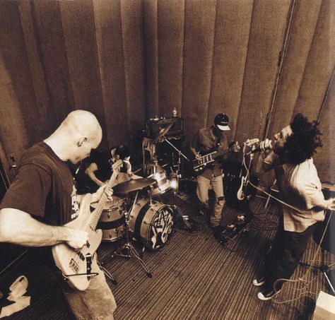 rage against the machine in the studio | PoP dEFECT RADIO: Rage Against The Machine Brad Wilk, Tim Commerford, Bulls On Parade, Rehearsal Studios, Tom Morello, Lisa Johnson, Neil Peart, Evil Empire, Machine Photo