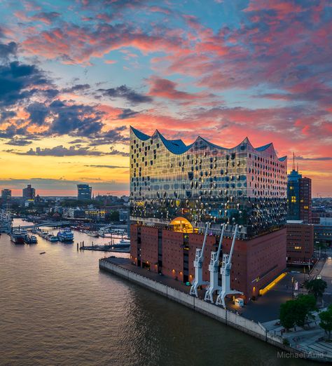 The Elbphilharmonie concert hall in Hamburg, Germany at sunset Hamburg Germany Aesthetic, Hamburg Germany Travel, Fairytale Photoshoot, Photoshoot Backdrops, Sunset Images, Hamburg Germany, Concert Hall, Germany Travel, Beautiful Sunset