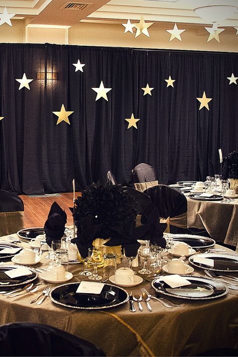 Black Backdrop With Gold Stars Black Photo Backdrop Ideas, Star Graduation Theme, 60th Birthday Quotes, Fame Ideas, Starry Night Theme, Leadership Ideas, Alice In Wonderland Decorations, Golden Night, Wonderland Decorations