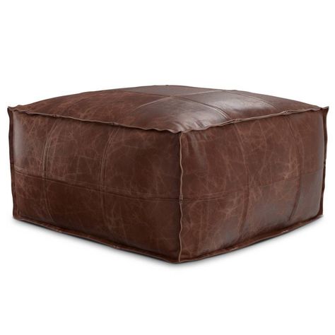 Make a tasteful addition to your home décor with the Erving Coffee Table Pouf. The pouf is upholstered in a distressed look aniline-dyed genuine buffalo leather that wears and softens over time. Perfect size for a coffee table, stand-in footrest or spare seating. This versatile pouf is sure to enhance the style of your space. Coffee Table Pouf, Ottoman Leather, Coffee Table Stand, Square Pouf, Table Stand, Leather Frames, Leather Pillow, Leather Pouf, Upholstered Ottoman