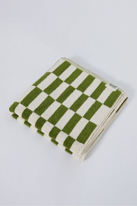 The Alber is a tribute to the timelessness of the checkered pattern. A slight twist on the classic patchwork of squares, this towel is intended for those seeking elegance updated with a hint of irreverence. This unisex, terry cloth towel comes in our signature martini olive and natural cotton colors. Made from 100% organic cotton in Portugal. Checkered Bath Towels, Checkered Towels, Bathroom Upstairs, Bath Window, Martini Olive, 2025 Wedding, Green Towels, Basement Remodel, Towel Pattern