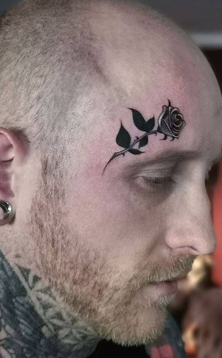 Face Tattoo Cover Up Ideas, Rose Face Tattoo Men, Rose Face Tattoos For Women, Rose Tattoo On Face, Face Tattoo Men Ideas, Face Tattoo Men Eyebrow, Forehead Tattoo Men, Face Tattoos For Women Eyebrow, Simple Face Tattoos For Women