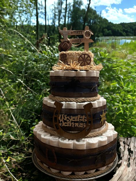 Western Shower Ideas, Cowboy Diaper Cake Boys, Western Diaper Cake Boys, Cowboy Diaper Cakes For Baby Boy, Cowboy Diaper Cake, Western Diaper Cake, Western Baby Shower Cake, Baby Shower Cupcakes For Boy, Baby Boy Cowboy