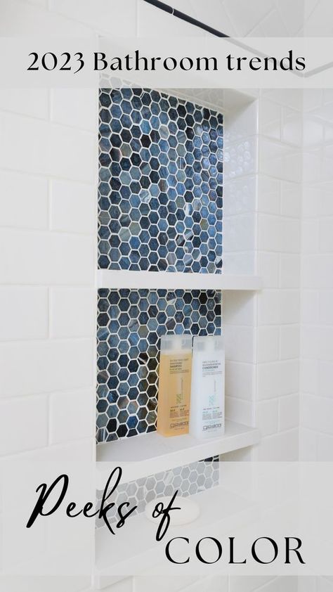 This year, color, texture, shapes, and fixtures are among the top bathroom trends the Normandy Designers are excited about. Here’s what you can expect to see among the 2023 bathroom trends... Shower Inserts For Shampoo, New Trends In Bathrooms, Small Bathroom Ideas Blue Tile, Blue And White Bathroom Floor Tiles, Blue Pebble Shower Floor, Blue And White Bathroom Tile Ideas, Navy And White Tile Bathroom, Bathroom With Blue Shower Tile, Accent Tiles In Bathroom