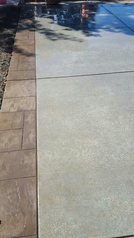 Finished product!! Driveway broom finish with stamp perimeter driveway by KRCC Modern Farmhouse Landscaping, Stamped Concrete Patterns, Driveway Edging, Stamped Concrete Driveway, Yard Remodel, Colored Concrete, Driveway Ideas, Concrete Patio Designs, Front Walk