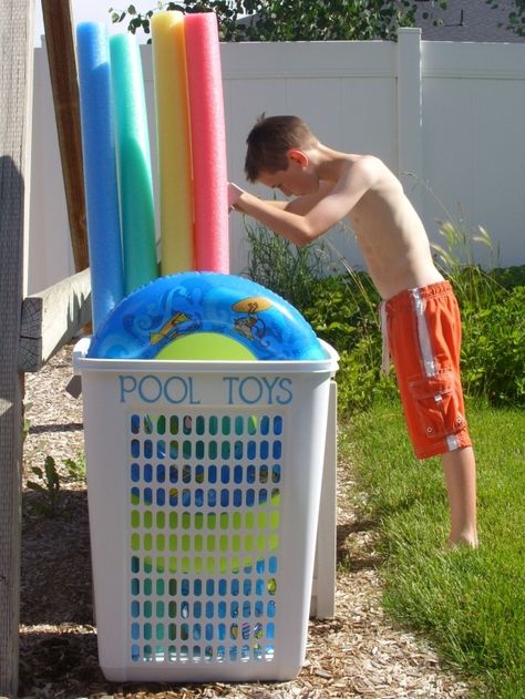 Use a big laundry hamper to corral oversized pool toys. | 7 Easy Organizing Tricks You'll Actually Want To Try Pool Toy Organization, Pool Organization, Pool Float Storage, Pool Toy Storage, Outdoor Toy Storage, Toy Storage Ideas, Pool Storage, Living Pool, Pool Toy