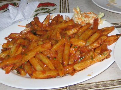 Masala Chips in Kenya Kenyan Cuisine, Chips Masala, Kenya Food, Masala Chips, Kenyan Food, Oven Fries, Samosa Chaat, African Cooking, Chips Recipe