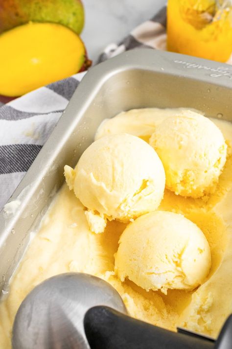 scoops of homemade mango ice cream Dough Enhancer, Homemade Frozen Yogurt Recipes, Vegan Mango Ice Cream, Cheap Baking, Homemade Mango Ice Cream, Homemade Frozen Yogurt, Orange Ice Cream, Ice Cream Vegan, Frozen Yogurt Recipes