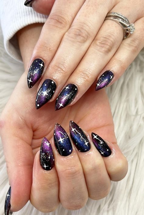 29 Galaxy Nail Art Designs to Shine in 2024: Cosmic Ideas for Stunning Nails Black And Purple Galaxy Nails, Galaxy Gel Nail Designs, Starry Night Prom Nails, Nail Art Themes Ideas, Galaxy Nails Designs, Space Nails Galaxy, Space Themed Nails, Nail Art Galaxy, Constellation Nail Art