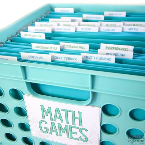 Math Organization Classroom, How To Organize Math Manipulatives, Math Unit Organization, Math Games Elementary School, Math Manipulative Organization, Math Game Storage, Math Game Organization, Math Station Organization, Bridges Math Organization