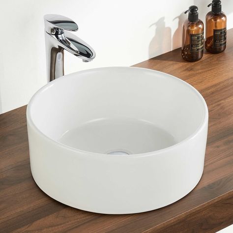 DeerValley vessel bathroom sink gives a simplistic yet elegant style to your bathroom. This ceramic circular vessel bathroom sink not only adds elegance to your bathroom, but it is also durable, stain-resistant, and easy to clean. Bowl Sink Bathroom, Vanity Wash Basin, Vessel Bathroom Sink, Wall Mount Faucet, Sink Countertop, Vessel Sink Bathroom, Bowl Sink, Diy Camper, Vessel Sinks