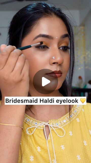 Bridal | Party Makeup Artist | Bangalore 🧿 on Instagram: "Haldi eyemakeup approved by Bridesmade . One of the easyyyyyy brezzzyyyyy eye look this is . Which can be done super quick 💛

Follow @prakruthi_b_rao 

Product deets 
Eyeshadow palette : @praush.beauty @makeuprevolution (from @vaibhavstores )
2 way gel : @paccosmetic 
Brushes : @reachedmars 
Pressed glitters : @cutie_beauty_official 
Lashes : @uroparis 51 
Eyeliner : @praush.beauty 

#omsairam #eyemakeup #eyemakeuptutorial #haldieyemakeuplook #bridesmaidmakeup #weddingmakeup #weddinghaldi #fypシ #reels #makeupreels #bangaloremakeupartists" Haldi Eye Makeup Look Simple, Eye Makeup For Haldi, Haldi Makeup Look Simple, Eyeshadow Looks For Haldi, Haldi Ceremony Makeup Look, Haldi Eye Makeup Look, Haldi Mehendi Eye Makeup, Yellow Eye Makeup For Haldi, Haldi Eye Makeup Look Tutorial