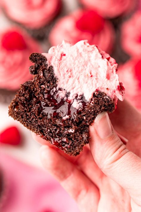 These Chocolate Raspberry Cupcakes have a raspberry-filled center that are topped with a light and fluffy raspberry vanilla cream frosting! Serve these delicious cupcakes to friends and family in under 35 minutes! Chocolate And Raspberry Muffins, Chocolate And Raspberry Cupcakes, Choc Raspberry Cupcakes, Raspberry Cupcakes Filling, Raspberry Chocolate Lava Cupcakes, Dark Chocolate Raspberry Cupcakes, Chocolate Cupcakes Pink Frosting, Chocolate Cupcakes With Raspberry Filling, Raspberry Swirl Cupcakes