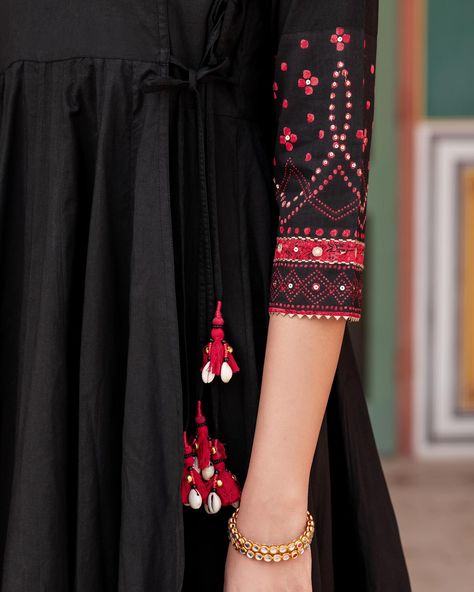 Bandhani - New Arrivals! Black is an incredibly versatile colour that can transition easily from day to evening wear, with the addition of a few accessories. Tie-dye bands accentuate the traditional appeal of this angarkha. Colourful thread work and bright tassels further enhance its appeal. Sizes available: S, M, L, XL [ Cottons Jaipur, Cotton, Bandhani, Craft, Traditional wear, Handmade Kurtas, Everyday-wear, Festive] #cottons #cottonsjaipur #newarrivals #bandhani #summer #summer2024... Luxury Bandhani Print Kurta, Festive Semi-stitched Bandhani Print Kurta, Semi-stitched Bandhani Print Festive Dress, Black Cotton Dupatta With Bandhani Print, Luxury Semi-stitched Bandhani Print Kurta, Bride Fashion Photography, Bandhani Dress, Churidar Designs, Indian Designer Suits