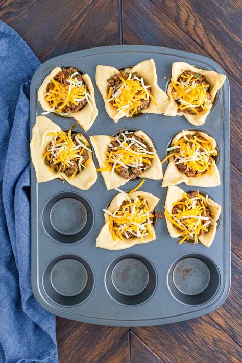 More cheese topping the taco meat in muffin tin. Croissant Tacos Crescent Rolls, Mexican Crescent Roll Recipes, Taco Biscuit Cups, Taco Crescent Bake, Taco Croissant, Taco Ring With Crescent Rolls, Rolled Tacos Recipe, Crescent Roll Cups, Crescent Taco