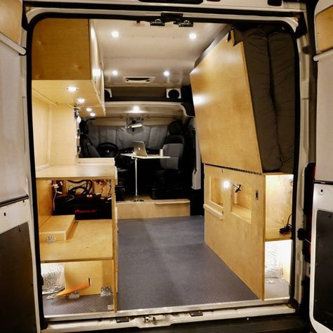 The Murphy bed swings away when not in use so you can load up bikes or... Used Camper Vans, Murphy Bed Desk, Trailer Storage, Modern Murphy Beds, Murphy Bed Diy, Murphy Bed Plans, Mobile Office, Camper Van Conversion, Bed Plans