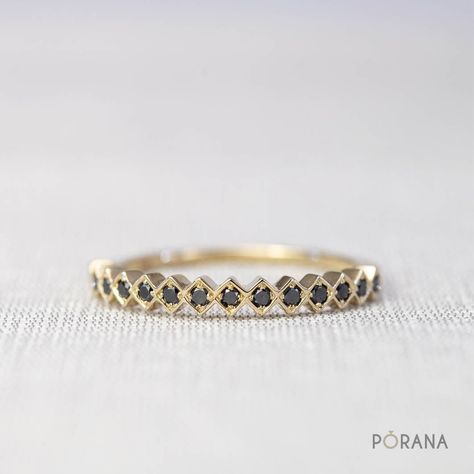 This sophisticated ring from our award winning design collection 'WEAVE', inspired by woven basketry, features a unique pattern of round black diamonds, which can stack with other rings in the collection to create your own woven pattern style. [R0032B] ✦ 14# Black Diamonds, round cut, total carat weight 0.15 (half circle ring) ✦ Natural Black Diamond, AAA quality ✦ Ring width: 2.5mm, height: 1.8mm ✦ Metal available: 14K and 18K solid gold (white gold, rose gold, yellow gold) and Platinum950. Please select from the drop down menu ✦ Ring sizes available 3-8. Please add ring size in Note when order. (other sizes than this please contact me) ⌘ Eternity and ¾ band are also available, please message ring size and metal you want for quotation. ⌘ WEAVE collection receives DEmark (Design Excellence Black Diamond Band Ring, Black Diamond Band, Baguette Diamond Wedding Band, Black Diamond Bands, Stackable Rings Wedding, Cute Engagement Rings, Diamond Band Ring, Baguette Diamond Rings, Gold Ring Stack