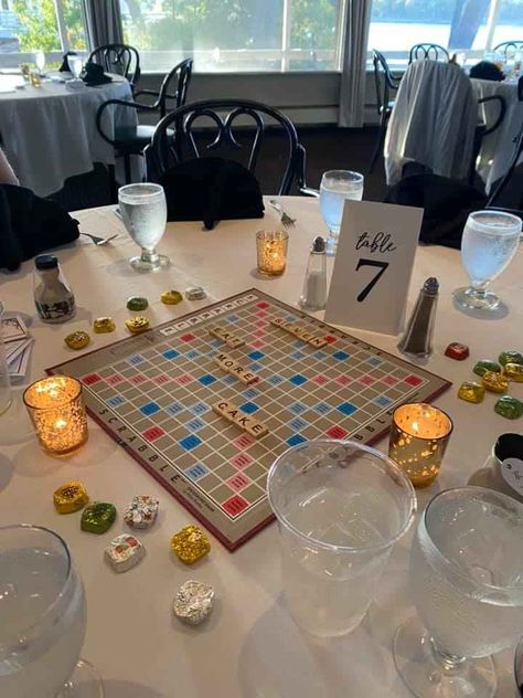 Boardgame Centerpieces Wedding Reception, Board Games Wedding Centerpieces, Board Game Table At Wedding, Scrabble Centerpieces, Board Games At Wedding, One Piece Wedding Theme, Wedding Board Games Table, Game Wedding Centerpieces, Board Game Wedding Theme