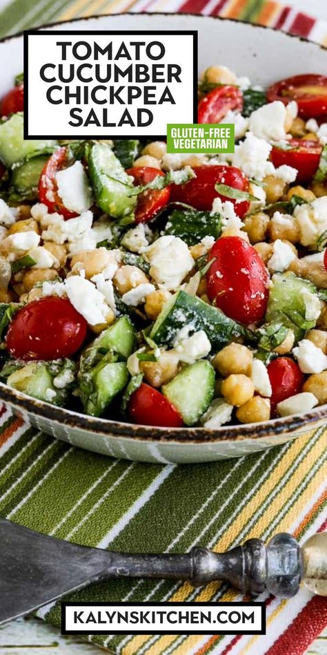 Pinterest image for Tomato Cucumber Chickpea Salad showing salad in a bowl sitting on a striped cloth. Greek Tomato Cucumber Salad With Crispy Chickpeas, Cucumber Tomato Garbanzo Salad, Low Carb Chickpea Salad, Cucumber Garbanzo Bean Salad, Cucumber Chickpea Salad, Garbanzo Salad, Garbanzo Bean Salad, Garbanzo Bean Recipes, Cucumber Feta Salad