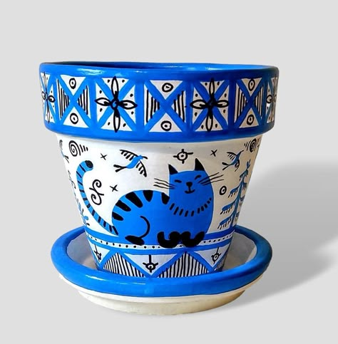 "Are you Tired of boring flower pots in your interior or garden? \"Folklore Flower Pot\" studio will help to decorate your house with fabulous flower pots. My planters are hand-painted in the style of folk painting of the North Europe and are filled with ancient symbols of well-being, health and prosperity. You can choose a color and decoration of pot from examples. This size good for small succulents. All products are signed by the artist, made of quality ceramic and have a drainage hole. Saucer included. Size: hight-4\", wide-4\", bottom- 2.5\" All rights reserved, all designs are property of \"Folklore Flower Pot\". Please, no any violation with copyright lows. Ships from Los Angeles ,California. No returns." Flower Pot Ceramic, Painted Flower Pot, Painted Pot, Plant Pot Design, Flower Pot Art, Painted Pots Diy, Painted Plant Pots, Painted Clay Pots, Flower Pot Crafts