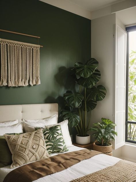 Create an urban jungle in your bedroom by incorporating lush plants, such as monstera or snake plants. Enhance the natural aesthetic with a macrame wall hanging and earthy-toned bedding for a tranquil and trendy space. Monstera Bedroom, Urban Jungle Bedroom, Jungle Bedroom, Lush Plants, Snake Plants, Natural Aesthetic, Urban Oasis, Snake Plant, Urban Jungle