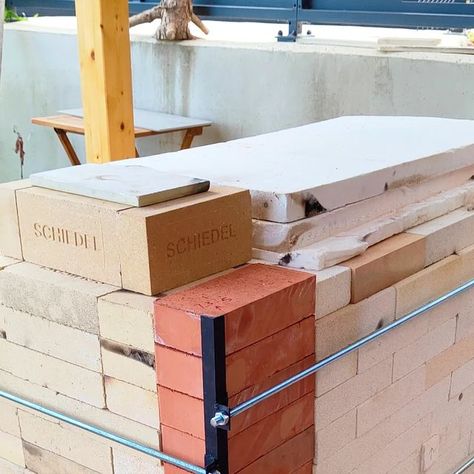 Dan Palmer on Instagram: "After yesterday's welding shenanigans, I've fitted the frame to the kiln and tightened it up. A little black paint on the uprights made them look much more professional 😅.   On reflection I might have positioned one of the threaded bars slightly differently, but it's fine.   The red bricks are normal house bricks that I used to fill the corners to make the frame easy to fit. They won't get much heat, relatively, so they should be good, I hope. They were like 1.25 euros each, compared with 5-8 euros for kiln bricks.  #ceramics #pottery #kilns" Home Kiln, How To Fire Clay Without A Kiln, Brick Kiln Design, Kiln Firing Schedule, Skutt Kiln, Normal House, Pottery Kiln, Kiln, Red Bricks