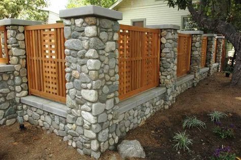 Custom Pillars covered with stone veneer and fine carpentry fence.#constructin #losangeles #theultimatepro Stone Fence, Fence Gate Design, Brick Fence, Building A Fence, Front Yard Fence, Cedar Fence, Wooden Door Design, Fence Landscaping, Modern Fence