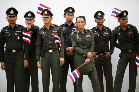 Thai police show the flag. Feb 2010 Police Uniform Philippines, Singapore Police Force, Indian Police Service, Community Policing, Thailand Army Ww2, Police Dogs In Action, Government, Captain Hat, Thailand