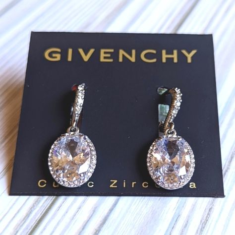 From Givenchy Oval Jeweled In Silver Tone Cubic Zirconia Jacket Drop Earrings New With Tags Get These Glamorous Earrings For Yourself, Or Someone Else Beautiful Addition To Any Jewelry Collection See Photos For Detail And Condition *Any And All Measurements Are Approximate* Feel Free To Make An Offer! Thank You For Looking! See Photos For Details All Measurements Are Approximate Feel Free To Make An Offer Thank You For Checking Out My Closet Top Rated Seller Over 1k+ Items Sold Tags: Designer, H Givenchy Earrings, Givenchy Jewelry, Monogram Earrings, Jacket Earrings, Engraved Earrings, Vintage Givenchy, Medium Hoop Earrings, Faux Pearl Earrings, Earring Jackets