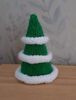 FREE Mini Christmas Tree Knitting Pattern – Knitting by Post Tree Knitting Pattern, Hungarian Pancakes, Christmas Tree Knitting, Christmas Tree Knitting Pattern, Knitted Christmas Tree, Holiday Knitting, Christmas Knitting Projects, Knit Christmas Ornaments, Knitted Christmas Decorations