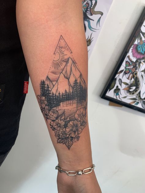 Flowers , fine line , geometric Nature And Flower Tattoo, Fine Line Tattoo Half Sleeve, Woman’s Western Sleeve Tattoo, Forearm Tattoo Women Travel, Feminine Water Tattoo, Mountain With Waterfall Tattoo, Women’s Mountain Tattoos, Mountain And Flower Tattoo Forearm, Women’s Sleeve Tattoo Ideas Nature