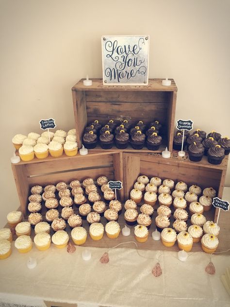 Cupcakes displayed in wooden crates for wedding Wooden Crates Wedding, Display Cupcakes, Wedding Cupcake Display, Rustic Cupcakes, Cupcake Stand Wedding, Graduation Cupcakes, Cupcake Display, Rustic Wedding Cake, Dessert Display