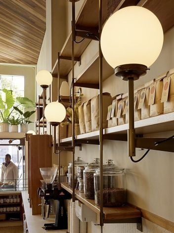 Sightglass' new location at 3014 20th St. in the Mission District was designed by Boor Bridges Architecture. Photo: Matthew Millman Sightglass Coffee, Coffee Thoughts, Glass Entrance Doors, Bridges Architecture, Custom Chandelier, Banquette Seating, Coffee Shop Design, Street Design, Shop Interior