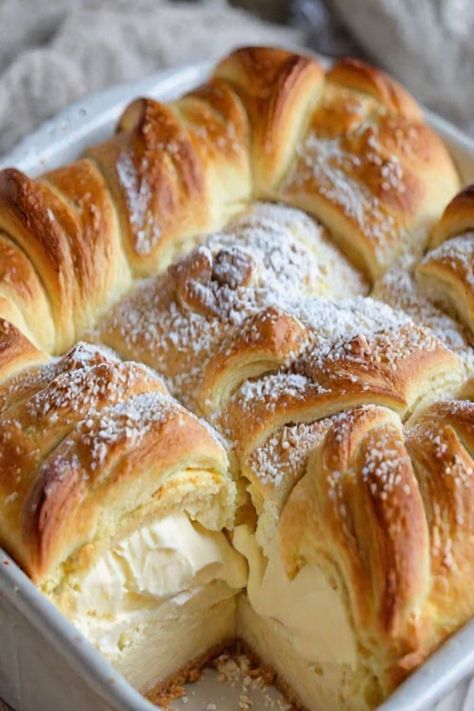 Cheesecake Crescent Rolls Casserole Recipe

Ingredients

- 2 cans (8 ounces each) crescent roll dough
- 16 ounces cream cheese, softened
- 1 cup sugar
- 1 teaspoon vanilla extract
- 1/2 cup powdered sugar
- 2 large eggs
- 1/4 cup butter, melted
- 1/2 teaspoon ground cinnamon

Full Cooking Instructions on... Crescent Roll Kolaches, Vanilla Cream Rolls, Crescent Roll Cream Cheese Recipes, Recipes With Crescent Roll Dough, Desserts With Crescent Rolls, Cheesecake Croissant, Rhodes Bread Dough Recipes, Crescent Dough Sheet Recipes, Canned Bread