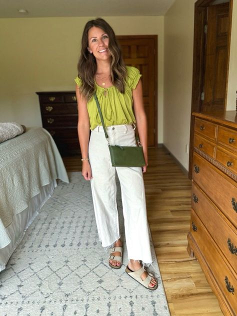 lime green babydoll top outfit, white wide-leg jeans fashion, casual summer outfit ideas, boho chic style, trendy babydoll top look, summer casual style, wide-leg jeans outfit inspiration, taupe suede Birkenstock sandals style, bohemian fashion, gold jewelry accessories, summer boho outfit ideas, lime green top and white jeans, casual everyday outfit, comfortable summer style, effortless chic fashion, lime green and white outfit ideas, summer outfit with Birkenstocks, casual chic summer look, trendy bohemian style, lime green fashion trends, babydoll top styling tips, casual boho chic look, taupe suede sandals outfit, trendy summer outfit ideas, casual chic outfit inspiration, bohemian summer fashion ideas, babydoll top with wide-leg jeans Green And White Outfit Ideas, Lime Green Top Outfit, Outfit With Birkenstocks, Lime Green Outfit, Babydoll Top Outfit, Lime Green Outfits, Green Shorts Outfit, Lime Green Pants, Green Top Outfit