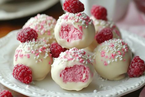 Discover how to make Raspberry Cheesecake Truffles with our easy recipe. Perfect for gifting or indulging in a decadent, chocolate-covered Raspberry White Chocolate Truffles, Raspberry Truffles Easy, Raspberry Balls Recipe, White Chocolate Raspberry Cheese Balls, Raspberry Cheesecake Truffles, Cakeballs Recipes, Raspberry White Chocolate Cheesecake Balls, Raspberry Cheesecake Balls, Cherry Mash Truffles