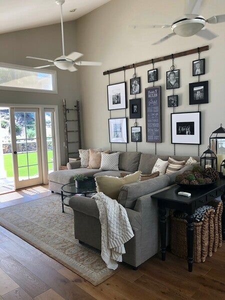 Check this photo out! Hanging Picture Frame Rail, Picture Frame Rail, Wall Behind Couch Decor, Decor Over Couch, Wall Behind Couch, Family Photos Wall Decor, Couch Wall Decor, Family Pictures On Wall, Family Room Walls