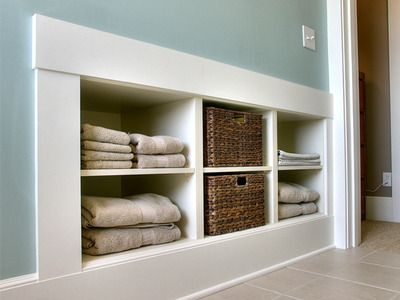 Go Into the Wall    For extra storage, consider building recessed shelves into a wall. You may only be able to go a few inches deep, but it may be adequate enough to hold towels, detergents and laundry supplies. Laundry Room Storage Shelves, Recessed Shelves, Room Storage Diy, Knee Wall, Casa Country, Attic Bedroom, Laundry Room Storage, Shelf Storage, Trendy Bathroom