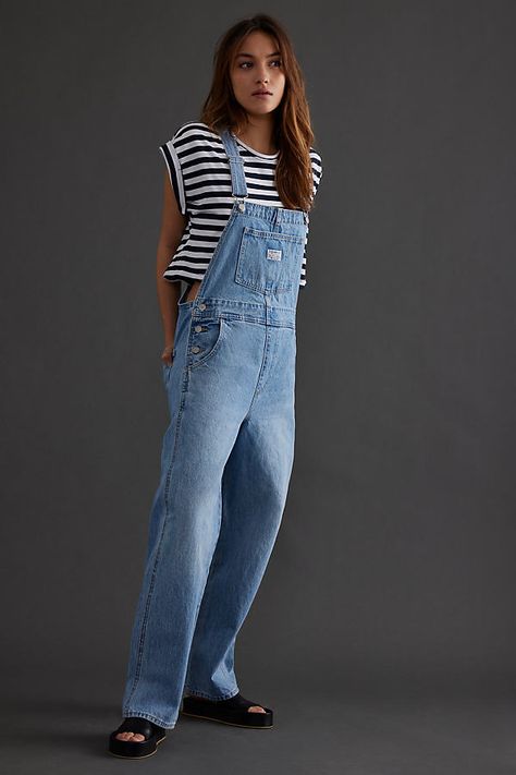 Overall, we think these denim dungarees by Levi's are a must-have for your spring wardrobe. Blue Dungarees Outfits, White Dungarees Outfits, Jean Dress Outfit, Jeans Dress Outfit, White Dungarees, Dungarees Outfits, Dungaree Outfit, Blue Dungarees, Denim Dungaree