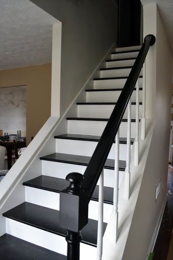 stairs - open on one side. this is what ours will look like when we open up the wall next to the dining room! Black And White Stairs, Stair Railing Makeover, Stair Renovation, Stairs Renovation, White Staircase, Black Stairs, Stair Makeover, White Stairs, Diy Staircase