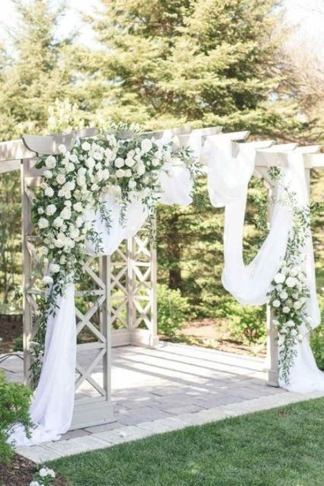 Pergola Wedding Decor, Outdoor Wedding Ceremony Arch, Draped Ceremony Arch, Greenery Wedding Arch |  #pergola #weddingceremony White Pergola Wedding Decorations, White Pergola Wedding, Ceremony Arch Greenery, Pergola Wedding Ceremony, Closed Pergola, Pergola Wedding Decorations, Hexagon Pergola, Pergola Architecture, Pergola Seating