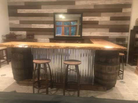 Whiskey Barrel Basement, Diy Whiskey Barrel Bar, Bar With Barrels, Bar With Whiskey Barrels, Old Saloon Bar Ideas, Corner Bar Shelves Ideas Liquor, Whiskey Barrel Bar Ideas, Wine Barrel Bar Ideas, Barrel Bar Ideas