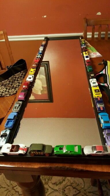 Cars mirror for boys room.decor Hot Wheel Mirror, Mirror For Boys Room, Car Room Design, Hot Wheels Mirror, Hot Wheels Room Decor, Guy Room Decor, Creative Bedroom Decor, Car Room Decor, Alcohol Bottle Crafts