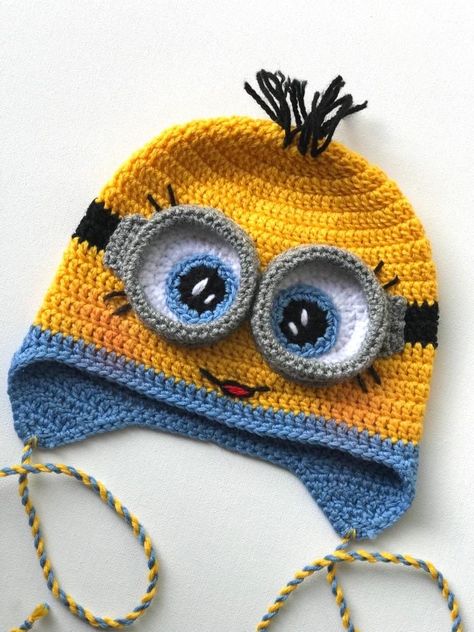 These beautiful handcrafted crochet Minion beanies are the perfect winter accessory. Stylish yet practical, they provide warmth to the wearer's head whilst being easily portable. They are stretchy to the wearer and will last many uses and occasions. They would make the perfect gift for males and females of all ages, or could be used for a dress-up party. Made with 100% Merino Wool.  Different size and style options available.  Please send me personal message with size you need As each beanie is How To Crochet Dolls, Harry Potter Crochet Hat, Crochet Minion Hat, Quick Crochet Gifts For Kids, Kids Crochet Hats, Kids Hat Crochet, Disney Crochet Hats, Minion Beanie, Crochet Hat Beanie