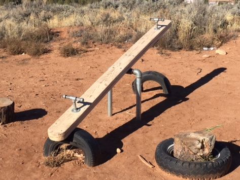 Diy Teeter Totter, Plastic Bottle Crafts Recycled, Playground Backyard Diy, Kids Outdoor Playground, Diy Kids Playground, Swing Set Diy, Reuse Old Tires, Wooden Beam, Diy Swing